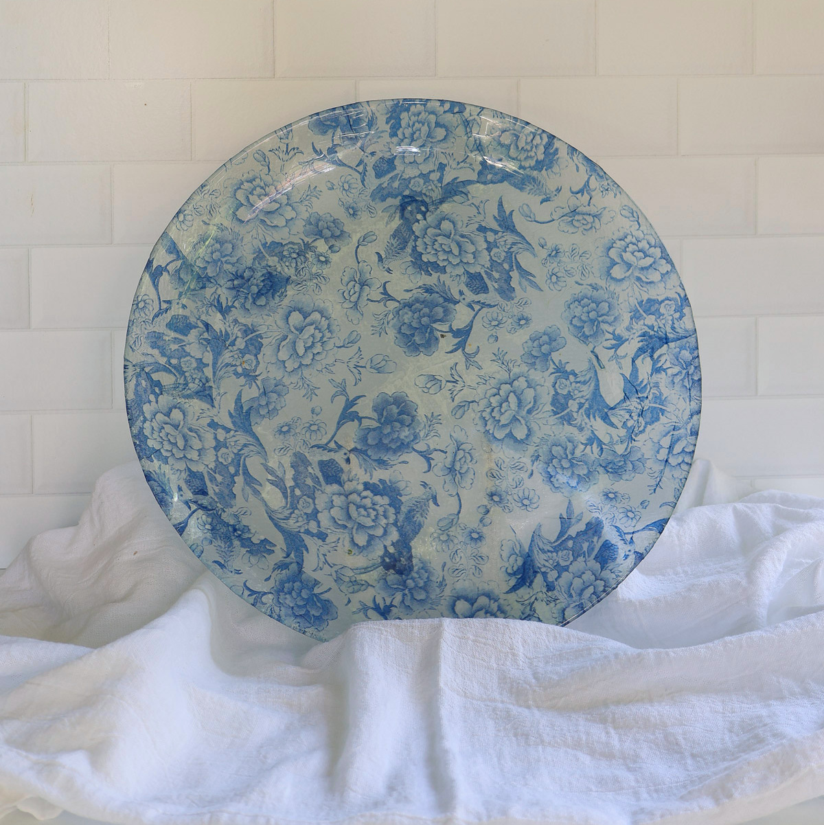 blue decoupage glass platter on stand