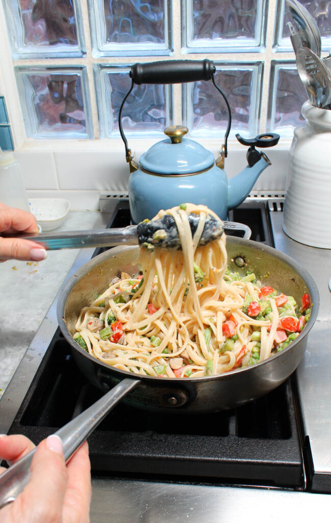 cooking pasta primavera