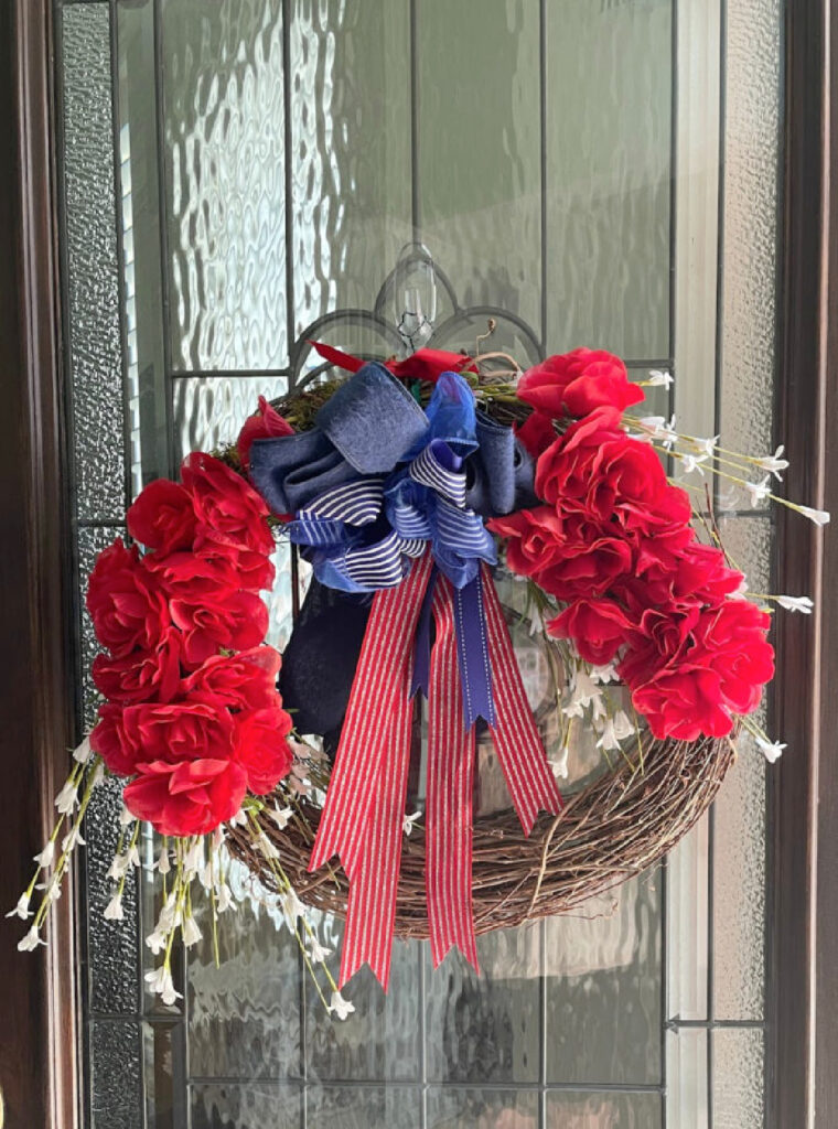 4th of July decorations wreath with red roses on front front