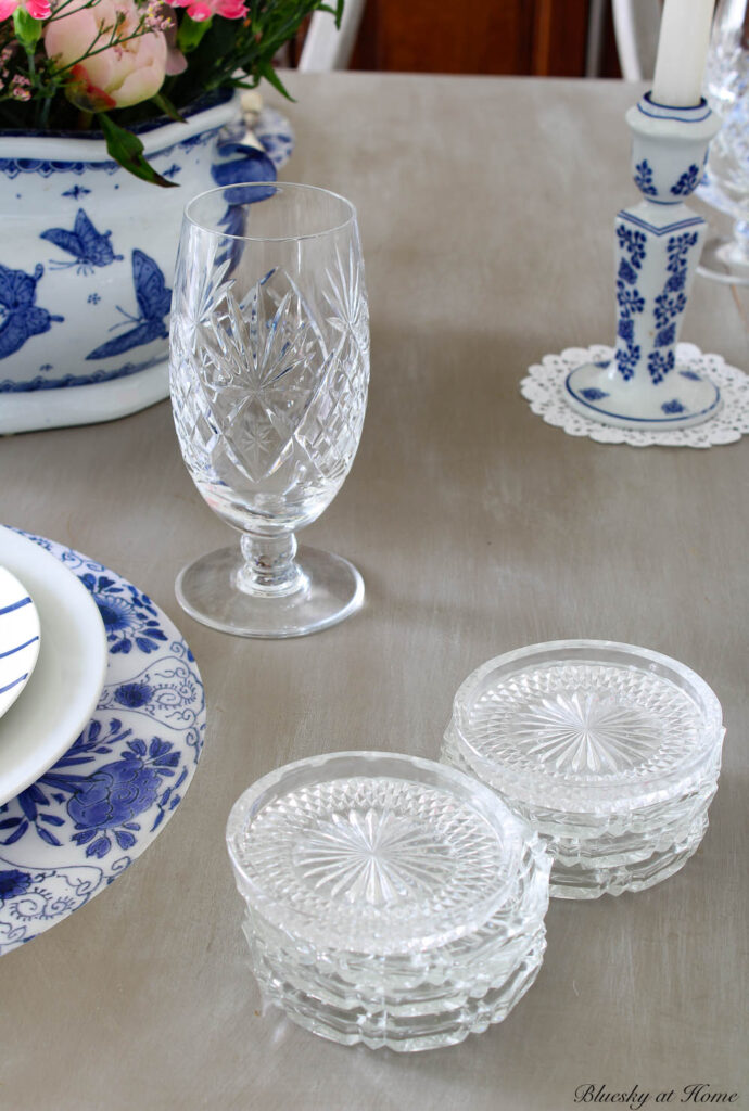 water glasses and glass coasters on pretty table