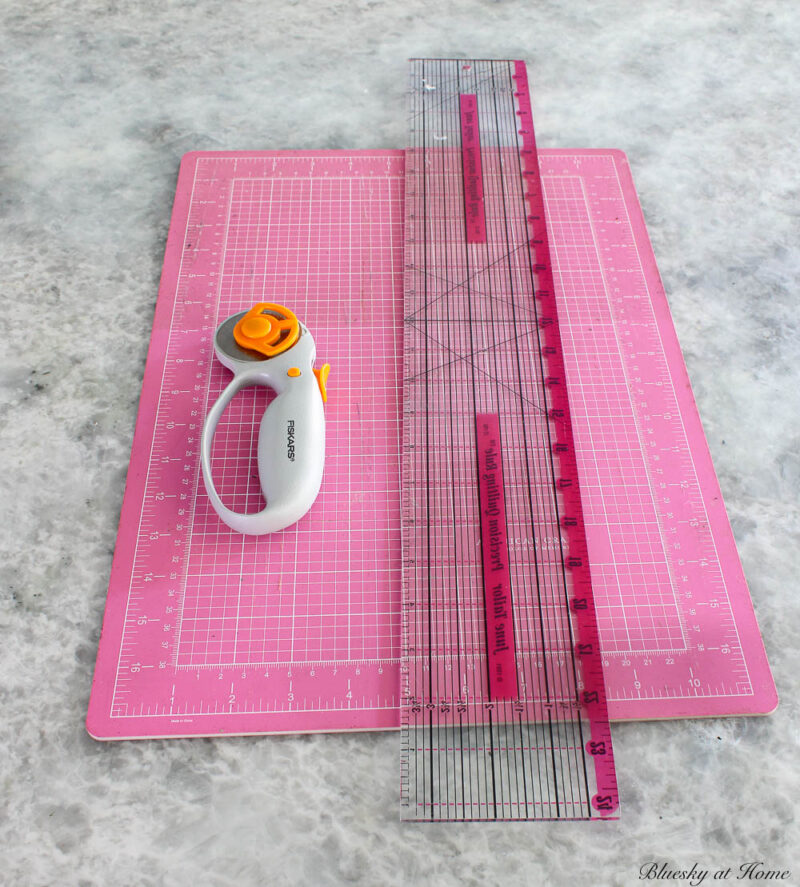 cutting mat, rotary cutter, and straight ruler