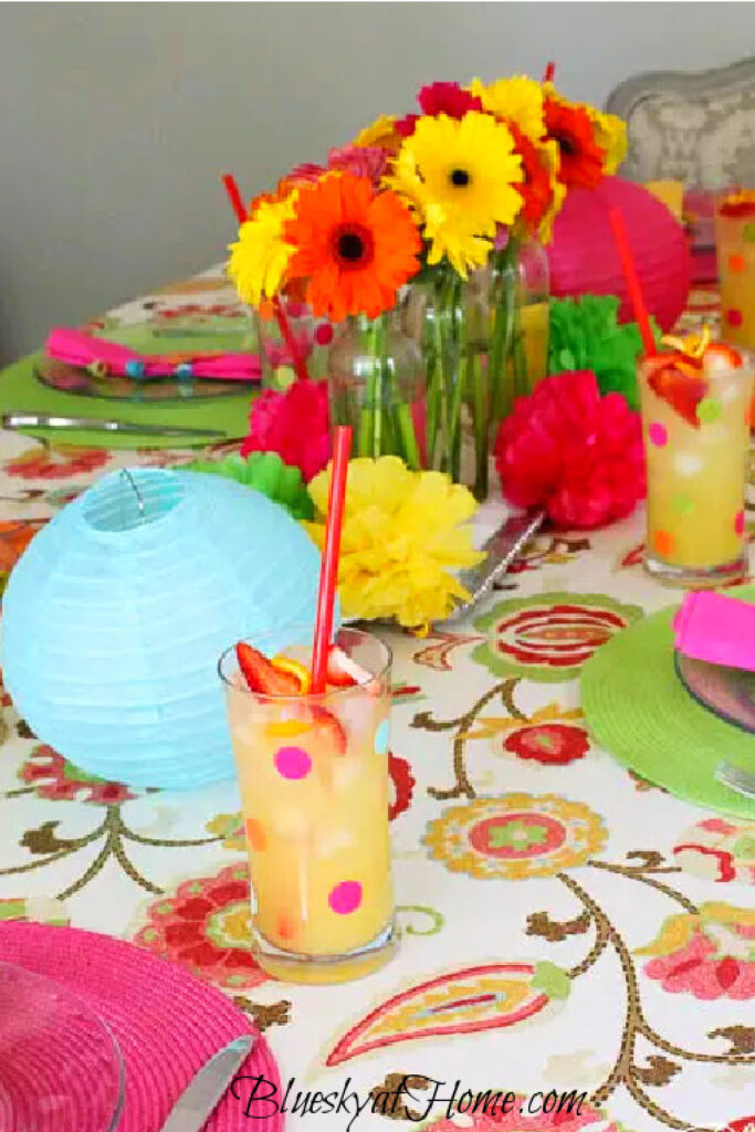 bright tropical colors in yellow, orange, and pink