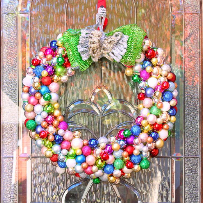 multi-colored Christmas wreath on front door
