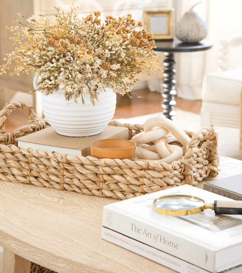 fall accessories vignette in natural colors and white on coffee table