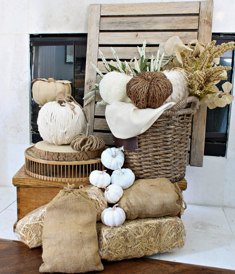 fall basket display on hearth in neutral colors