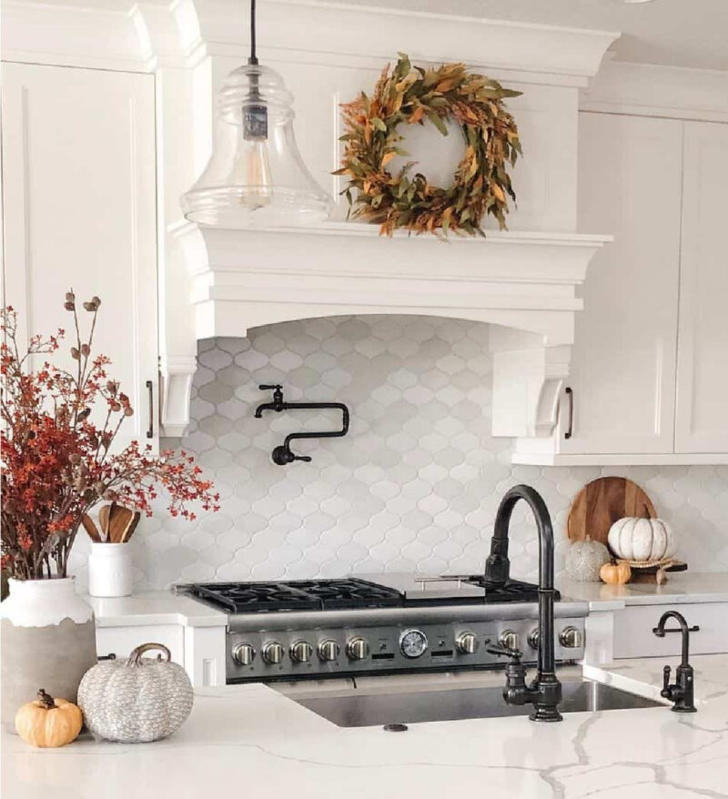 fall kitchen wreath on stovetop hood