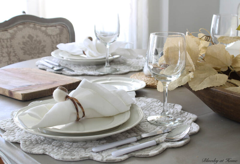 place settings with clear  wine glasses