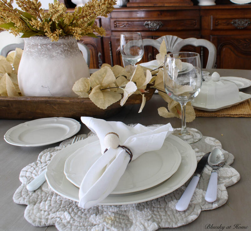 place settings with clear wine glasses