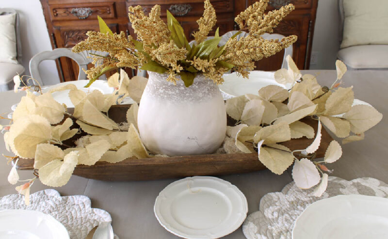 soft cream faux foliage on fall table