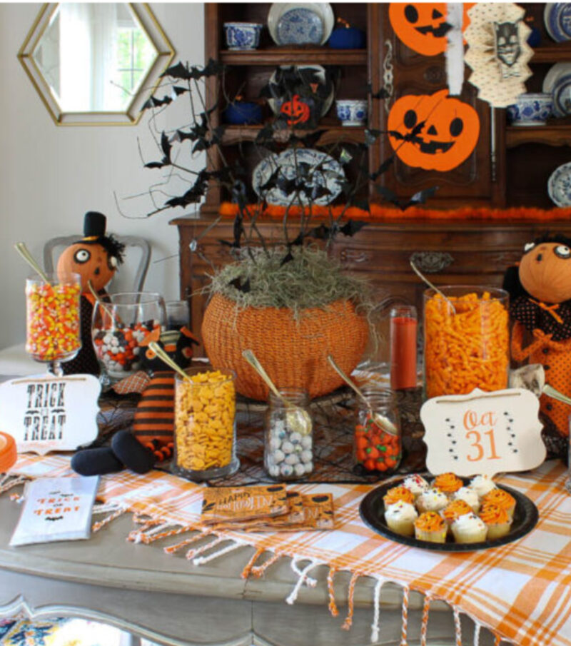 curly twig bat tree centerpiece on Halloween buffet table