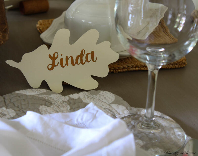 fall paper leaf place cards on dining room table