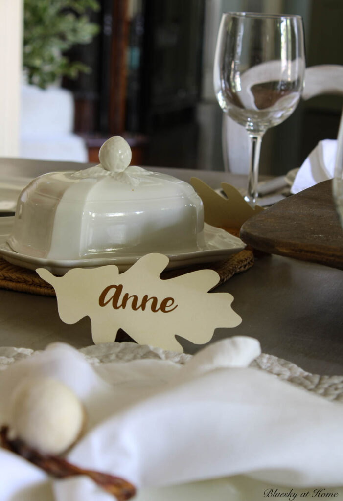 fall paper leaf place cards on dining room table