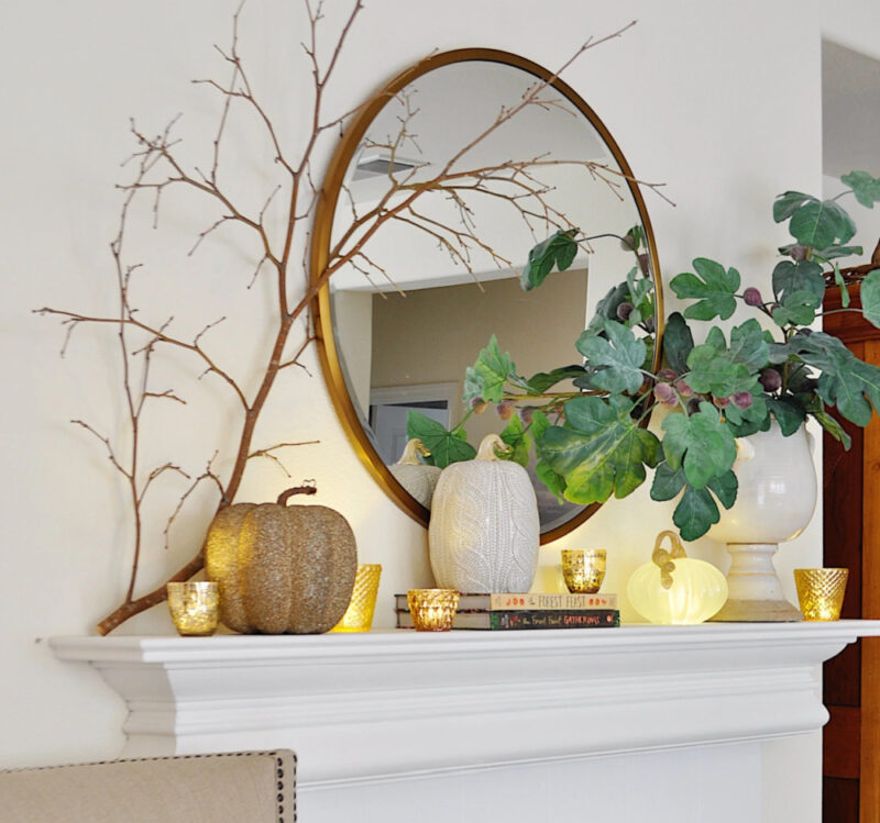fall mantel with mirror and branches