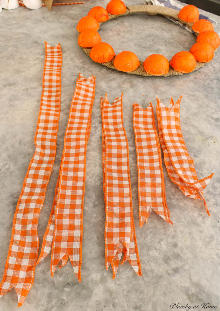 strips of orange and white wired ribbon