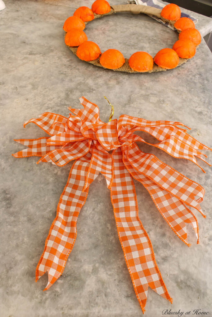 orange and white bow for Thanksgiving wreath