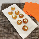 pumpkin risotto bites on white plate