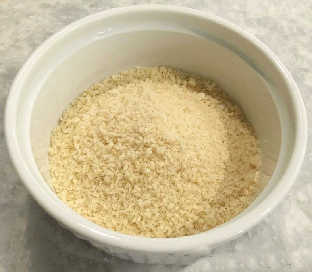 Pumpkin Risotto Bites Need to Be in Your Recipe Box ~ an easy, make~ahead appetizer that your guests will love and you will love to serve. panko bread crumbs in white ramekin