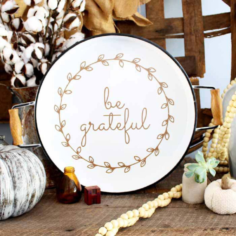 white platter with be grateful sign