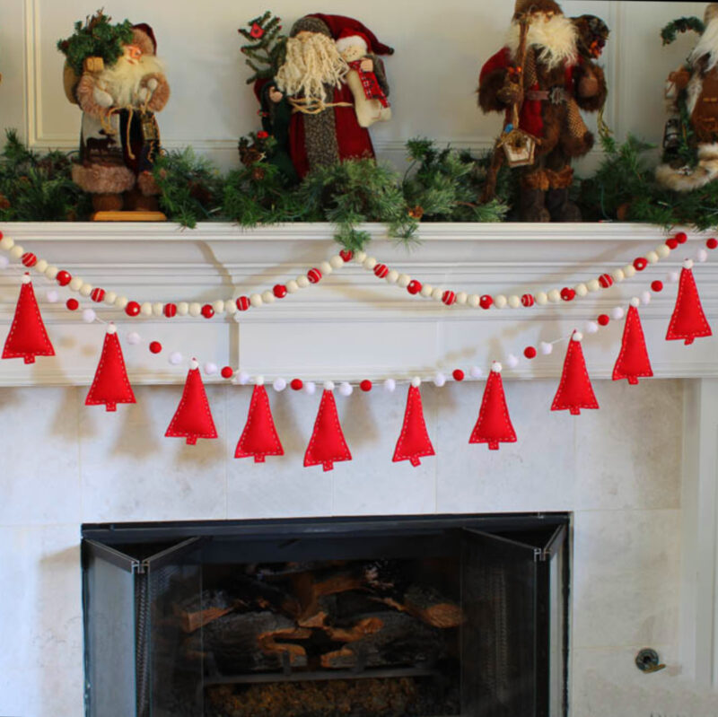 felt Christmas tree garland and felt ball garland on mantel