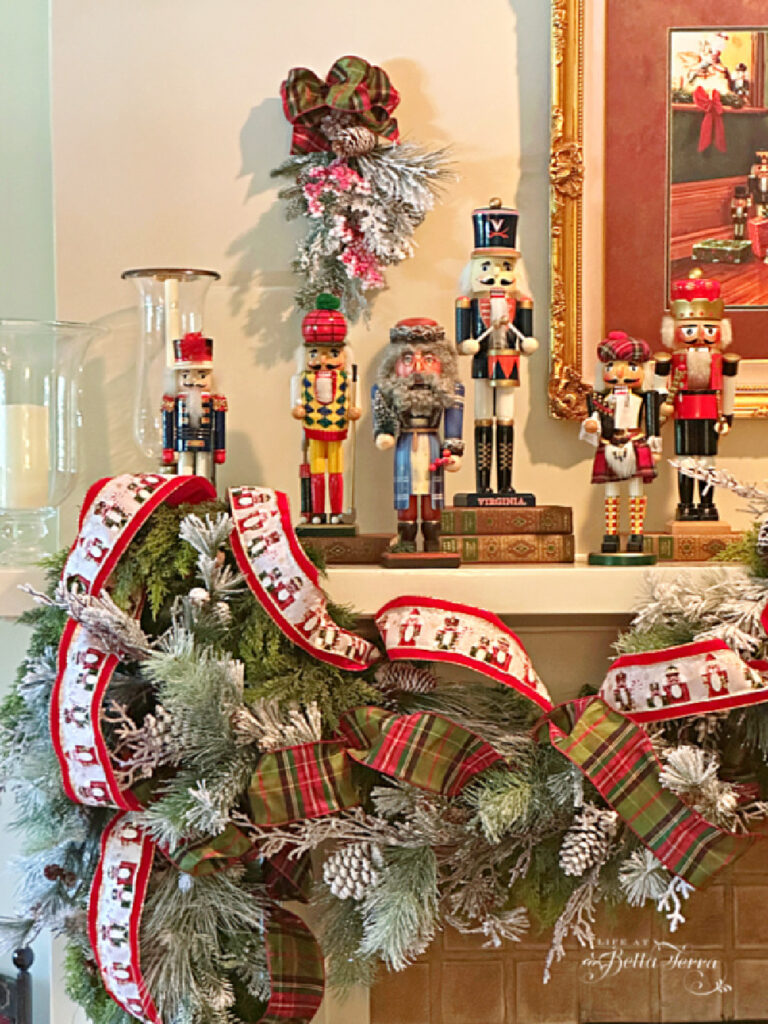 Christmas mantel with garland and nutcrackers