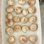 cinnamon roll cookies in Christmas baking pan