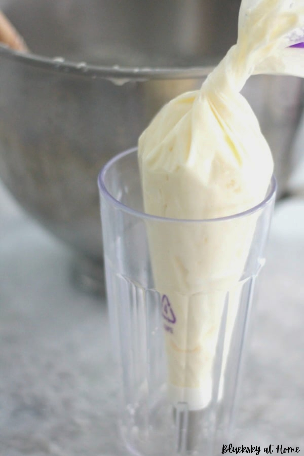 piping bag with icing in glass