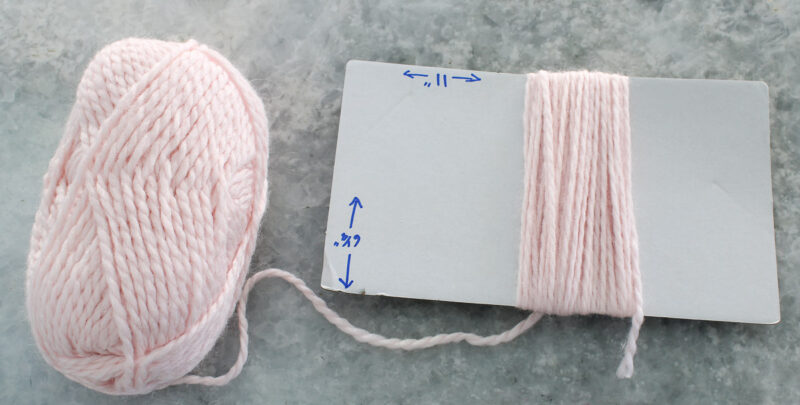 tassel template wrapping pink yarn