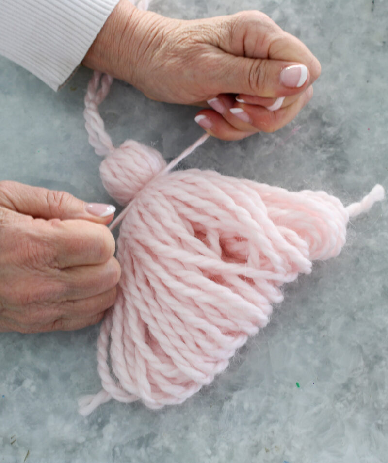 tying yarn on fringe