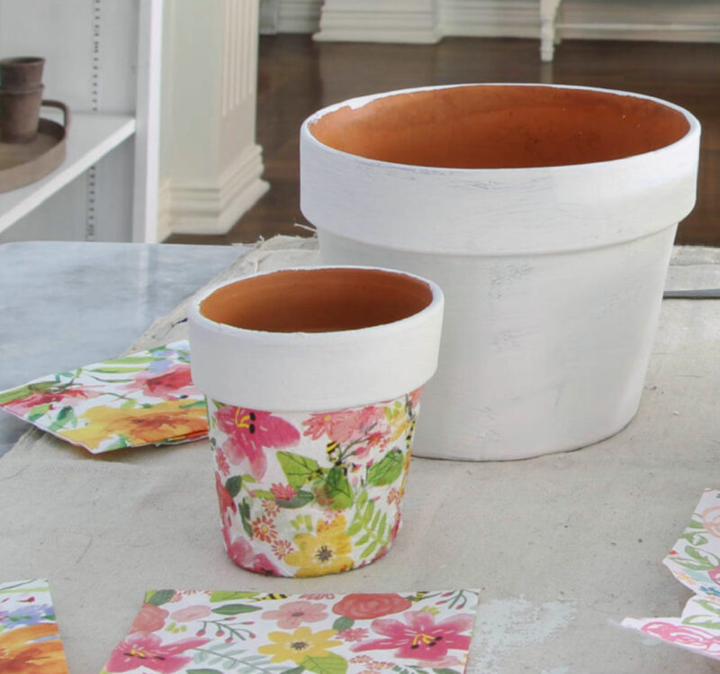 pastel floral napkin decoupaged on terra cotta pots