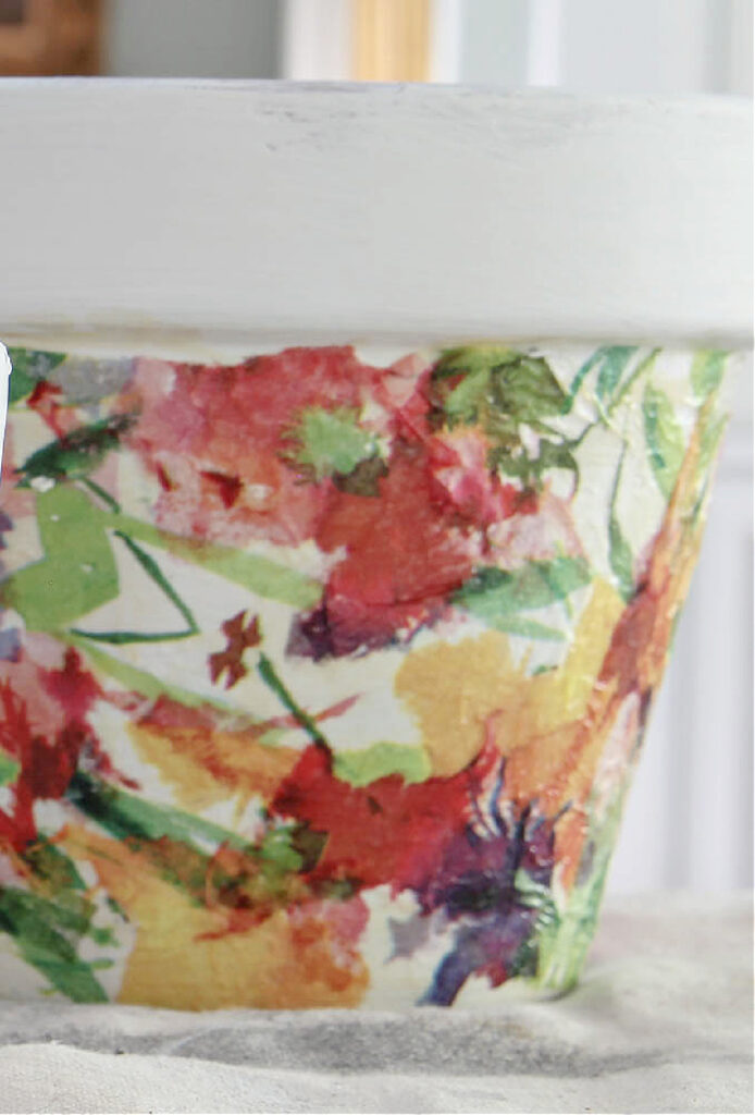 pastel floral napkin decoupaged on terra cotta pots