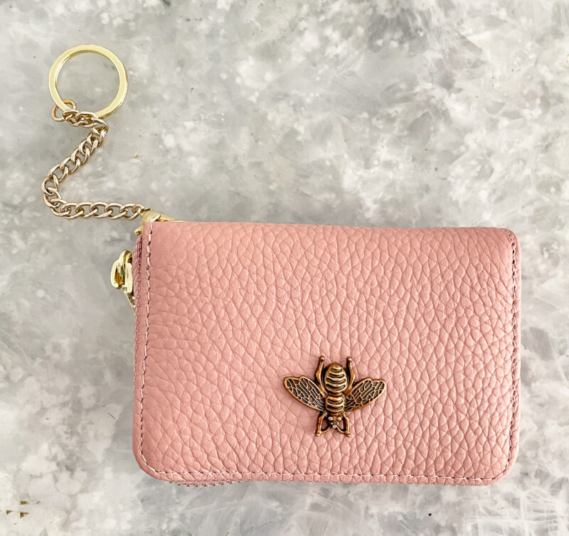 pink wallet with a bee 