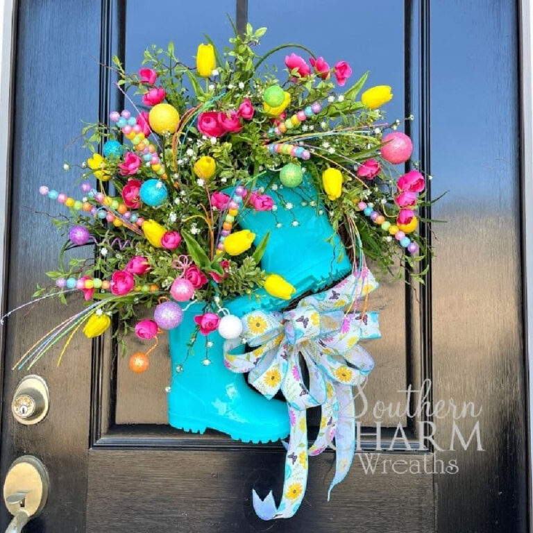 blue rainboot spring wreath with tulips on a black door