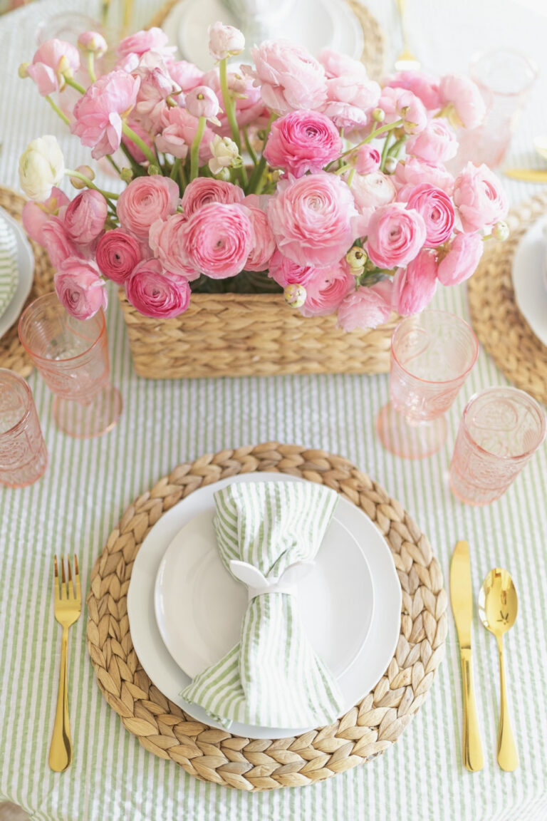 pink flowers in basket on Easter tablescape