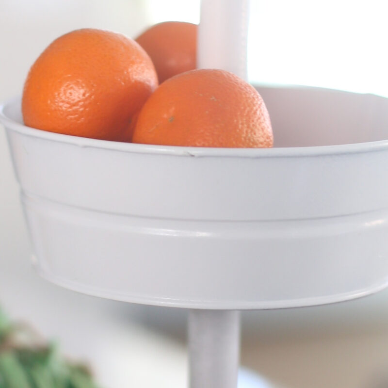 white tiered tray with oranges