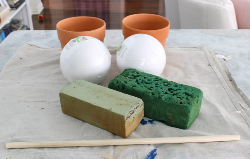terra cotta planters, white styrofoam balls, florist foam, and dowel rod