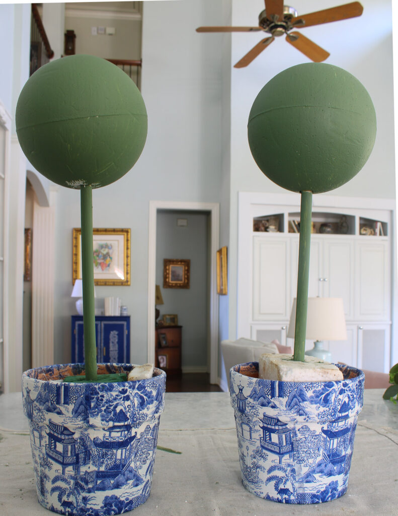 painted styrofoam balls in chinoiserie planters