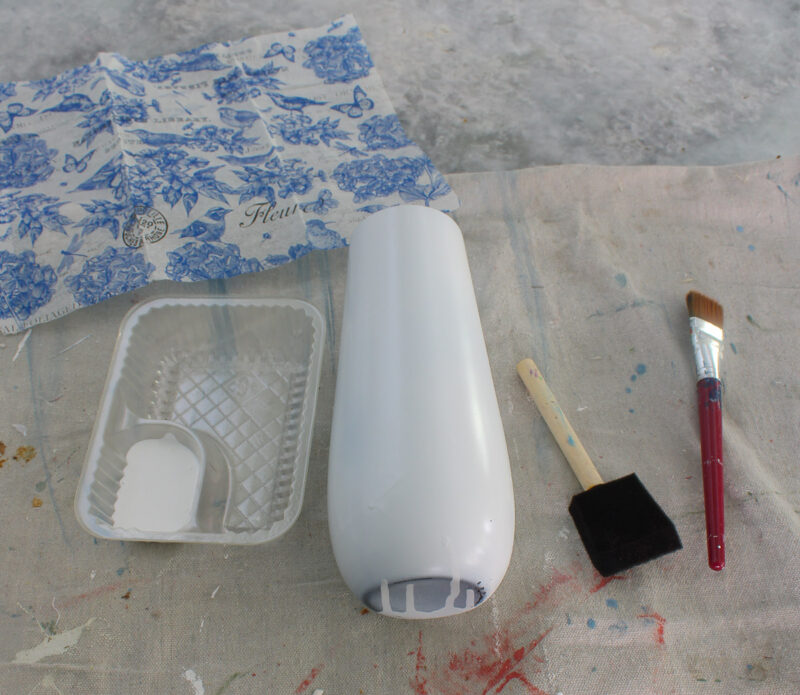 white painted vase with Mod Podge and brushes
