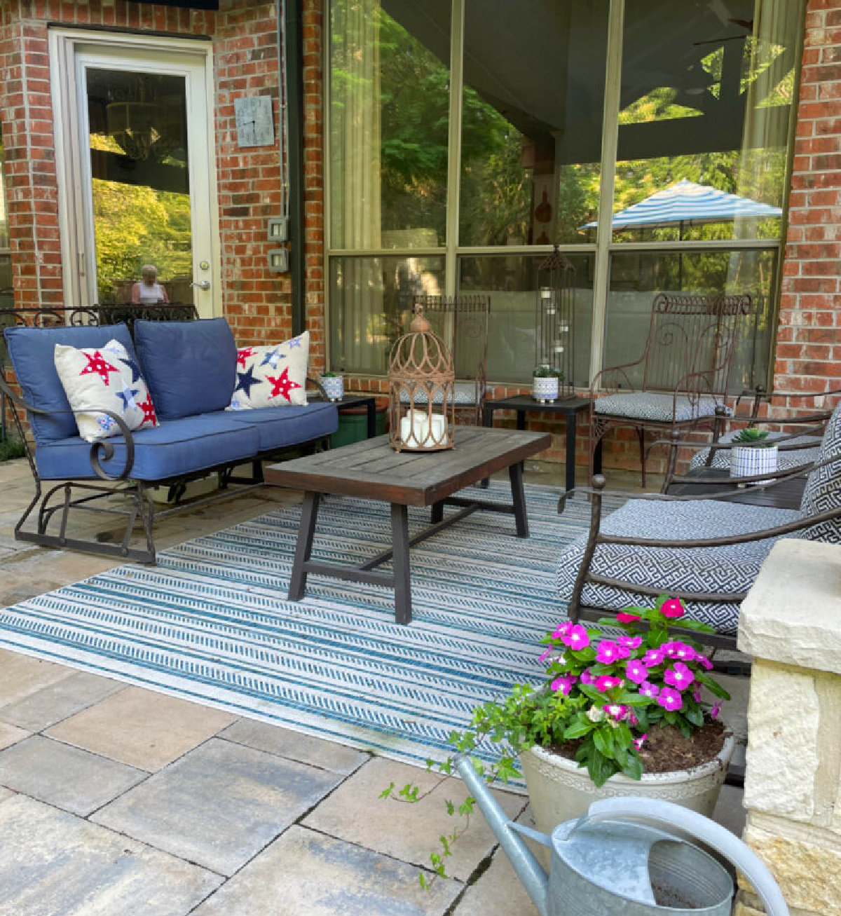 patio update with stone and outdoor rug and furniture