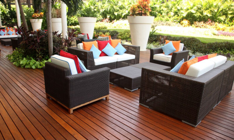 patio furniture with bright pillows