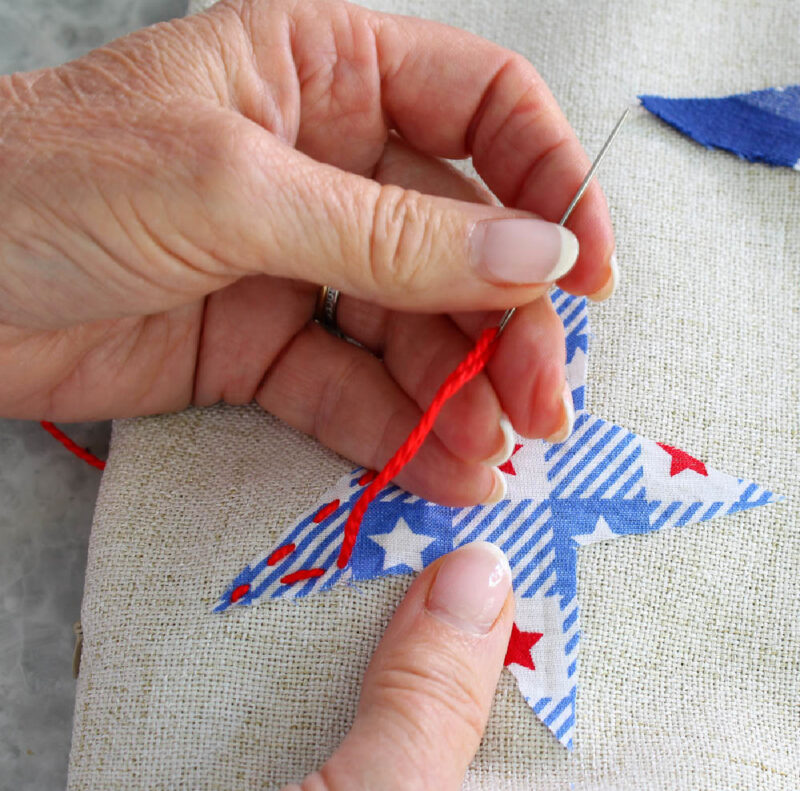 sewing stars on pillow