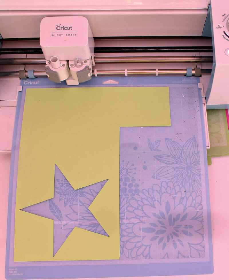 cutting star out with a Cricut