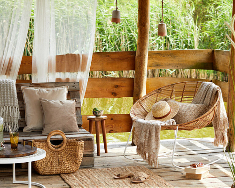 brown and neutral outdoor summer decor with neutral pillows