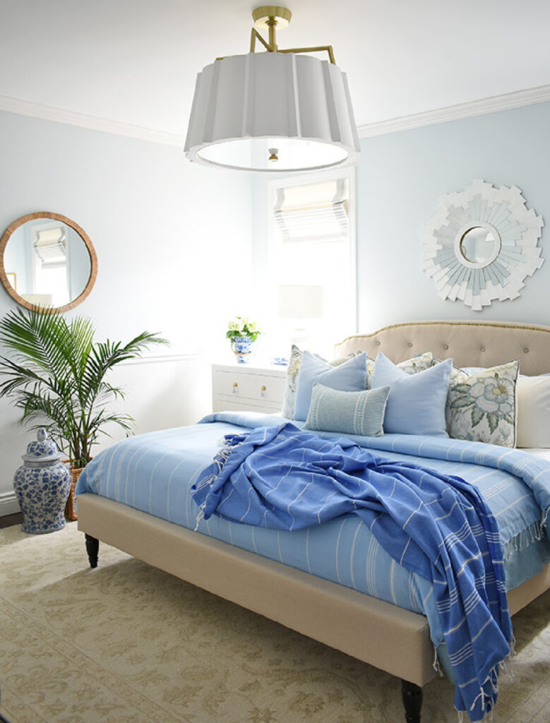 summer bedroom refresh with blue comforter and throw