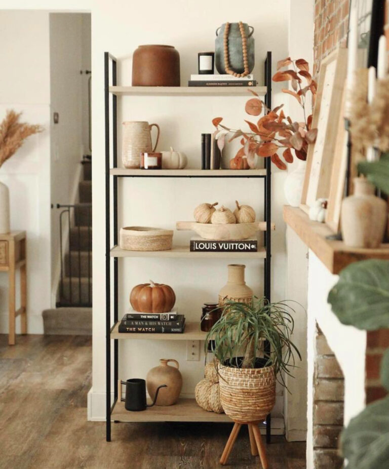 book shelves with fall decorative accents