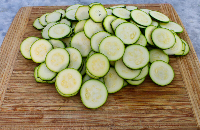 sliced zucchini on a cutting board