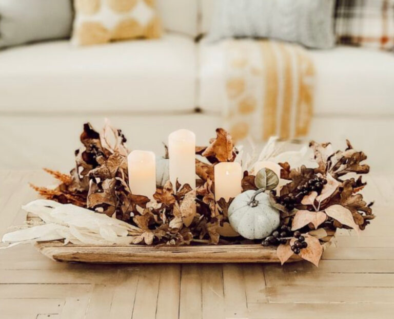 best fall centerpiece with candles, leaves, ands pumpkin