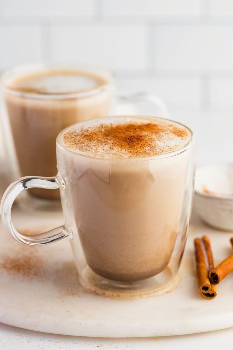 chai tea latter in a mug with cinnamon sprinkle