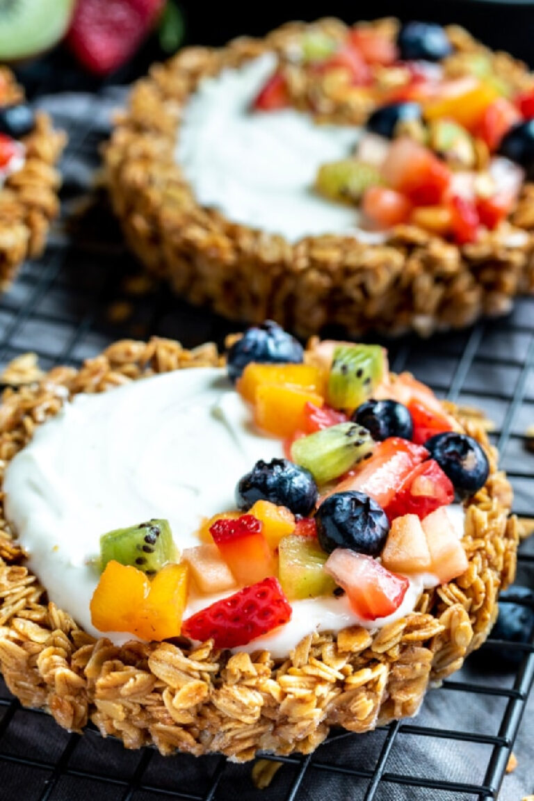 granola fruit tart with strawberries and blueberries