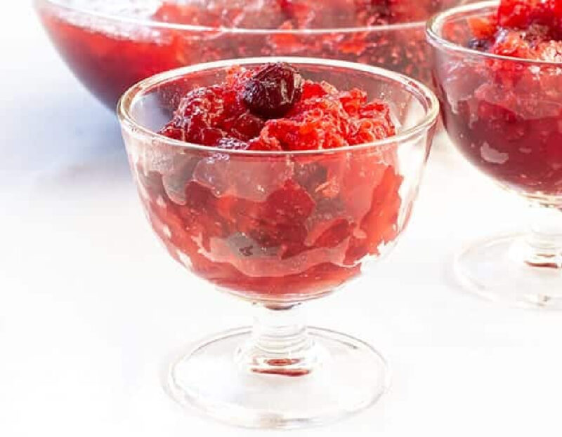 cranberry pineapple jello Thanksgiving salad in a glass sherbet cup