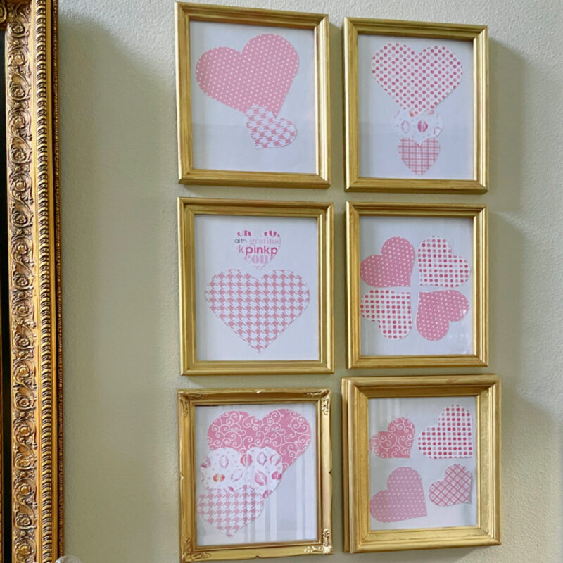 Valentine's Day paper hearts in gold frames